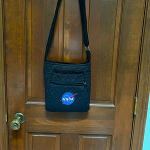 Pre-loved Quilted Crossbody purse with NASA logo. Comes with matching wallet.